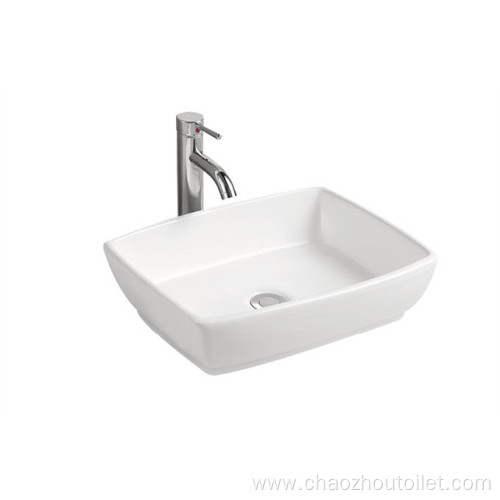 White color bothroom ceramic basin with mixer tap